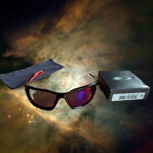 Oakley valve sunglasses with spare lenses.